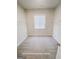 Bright walk-in closet with carpeted floors and wire shelving for optimal storage at 3695 Andover St, Cumming, GA 30028