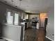 Charming kitchen with stainless appliances, hardwood floors, and pendant lighting at 2160 Creekview Trl, Decatur, GA 30035