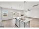 Stylish kitchen with a large center island, stainless appliances, and an open floor plan at 328 Wandering Brook Dr # 39, Mcdonough, GA 30253