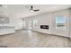 Bright and airy living room featuring a modern fireplace and natural light at 328 Wandering Brook Dr # 39, Mcdonough, GA 30253