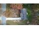 Overhead view of a house with a long driveway and mature trees at 321 Summerwood Ln, Stockbridge, GA 30281