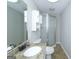 Bathroom featuring granite vanity, a toilet, and a walk-in shower at 321 Summerwood Ln, Stockbridge, GA 30281