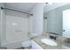 Bathroom featuring a vanity with a marble countertop and a shower-tub combo at 321 Summerwood Ln, Stockbridge, GA 30281