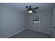 Bedroom with a ceiling fan and a window at 321 Summerwood Ln, Stockbridge, GA 30281