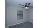 Bedroom featuring a fan, carpet and a window with natural light at 321 Summerwood Ln, Stockbridge, GA 30281