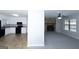 Open-concept layout combining the kitchen with a living area that features a cozy fireplace at 321 Summerwood Ln, Stockbridge, GA 30281