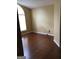 Spacious bedroom with hardwood floors and a large window providing ample natural light at 5734 Wellborn Oaks Ct, Lithonia, GA 30058