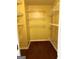 Walk-in closet with multiple shelving units and hardwood flooring for optimal storage and organization at 5734 Wellborn Oaks Ct, Lithonia, GA 30058