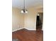 Dining area with classic chandelier and access to the kitchen and living spaces at 5734 Wellborn Oaks Ct, Lithonia, GA 30058