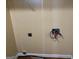 Laundry room wall with connections for a washer, dryer, and an electrical outlet at 5734 Wellborn Oaks Ct, Lithonia, GA 30058