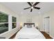 Bedroom featuring hardwood floors, ceiling fan, and natural light at 1188 Oakland Sw Ln, Atlanta, GA 30310