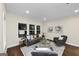 Bright and spacious living room featuring hardwood floors, natural light, and recessed lighting at 1188 Oakland Sw Ln, Atlanta, GA 30310