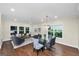 Open concept living and dining area filled with natural light and hardwood floors at 1188 Oakland Sw Ln, Atlanta, GA 30310
