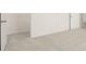 Open-concept bedroom with a walk-in closet and neutral paint and carpets throughout the interior at 600 Whitman Ln # 2026, Stockbridge, GA 30281