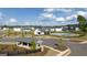 An aerial shot of the community pool, playground, and covered picnic area of this community, surrounded by well maintained homes at 600 Whitman Ln # 2026, Stockbridge, GA 30281