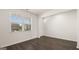 Bright and modern living room with wood floors and plenty of natural light at 600 Whitman Ln # 2026, Stockbridge, GA 30281