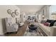 Bright, open living area with hardwood floors, stylish decor, and plenty of natural light at 600 Whitman Ln # 2026, Stockbridge, GA 30281