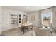 Bright home office featuring a modern desk, comfortable seating, and a large window at 600 Whitman Ln # 2026, Stockbridge, GA 30281