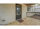 Inviting front porch with sturdy railings, a freshly painted siding, and gray accents at 5122 Hillcrest Nw Dr, Covington, GA 30014