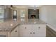 Open kitchen with granite countertops and stainless steel appliances at 5122 Hillcrest Nw Dr, Covington, GA 30014