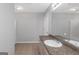 Bathroom with a neutral color palette and a granite countertop vanity area at 6566 Chestnut Oaks Rdg, Lithonia, GA 30038