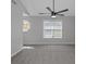 Bright bedroom with vaulted ceiling features new carpeting and a ceiling fan at 6566 Chestnut Oaks Rdg, Lithonia, GA 30038