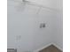 Laundry room area with overhead metal rack at 6566 Chestnut Oaks Rdg, Lithonia, GA 30038