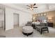 Open main bedroom provides comfort, a seating area, neutral tones, and a walk-in closet at 596 Whitman Lane # 2025, Stockbridge, GA 30281