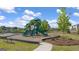 Community playground, green space, bench, surrounded by landscaping, sidewalks and trees at 596 Whitman Lane # 2025, Stockbridge, GA 30281