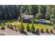 Charming home featuring a well-manicured lawn and mature landscaping at 250 Hester Rd, Carrollton, GA 30116