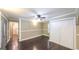 Bright living room showcasing hardwood floors and neutral wall colors at 250 Hester Rd, Carrollton, GA 30116