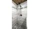 Updated shower features decorative tile, rock floor, and a modern shower head at 250 Hester Rd, Carrollton, GA 30116