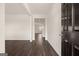 Inviting entryway boasts rich wood floors and an open floor plan at 592 Whitman Ln # 2024, Stockbridge, GA 30281