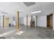 Unfinished basement with concrete floor, white walls, and exposed wooden support beams at 75 Bretts Bnd, Sharpsburg, GA 30277