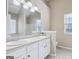 Bathroom features a double sink vanity and tile flooring at 75 Bretts Bnd, Sharpsburg, GA 30277