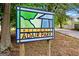 A picturesque sign for Historic Adair Park with its colorful geometric design and neighborhood backdrop at 988 Allene Sw Ave, Atlanta, GA 30310
