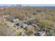 Picturesque aerial view of a neighborhood with tree-lined streets and diverse homes in the background at 988 Allene Sw Ave, Atlanta, GA 30310
