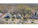 Aerial view of a neighborhood street showcasing well-maintained homes and tree-lined streets at 988 Allene Sw Ave, Atlanta, GA 30310