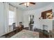 Bedroom features a fireplace and an ornate area rug at 988 Allene Sw Ave, Atlanta, GA 30310