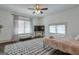 Bedroom featuring abundant natural light and a large patterned rug at 988 Allene Sw Ave, Atlanta, GA 30310