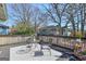 Inviting deck area with outdoor seating, plants, and stylish flooring, perfect for relaxation and entertaining at 988 Allene Sw Ave, Atlanta, GA 30310