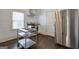 Modern kitchen featuring stainless steel appliances and a movable kitchen island at 988 Allene Sw Ave, Atlanta, GA 30310