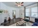 Inviting living room with stylish decor, a cozy fireplace, and comfortable seating at 988 Allene Sw Ave, Atlanta, GA 30310