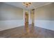 Dining Room with wainscoting, hardwood floors, and arched doorways at 509 Cowpens Rd, Social Circle, GA 30025