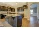 Kitchen with black cabinets, granite countertops, and stainless steel appliances at 509 Cowpens Rd, Social Circle, GA 30025