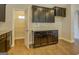 Modern kitchen with granite countertops, dark wood cabinets, subway tile backsplash, and a walk-in pantry at 509 Cowpens Rd, Social Circle, GA 30025
