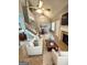 This open living room has a fireplace, staircase, and stylish furniture at 530 Shadowmoore Dr, Riverdale, GA 30274