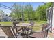 Outdoor patio featuring a seating area, perfect for enjoying the serene backyard at 949 Pike Forest Dr, Lawrenceville, GA 30045