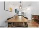 Open dining area with hardwood flooring, seamlessly connecting to the kitchen at 949 Pike Forest Dr, Lawrenceville, GA 30045