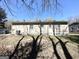 Backyard view of the house showing the exterior and the surrounding yard at 2566 Nw Santa Barbara Dr, Atlanta, GA 30318